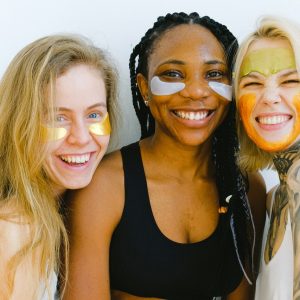 three women enjoying a facial treatment